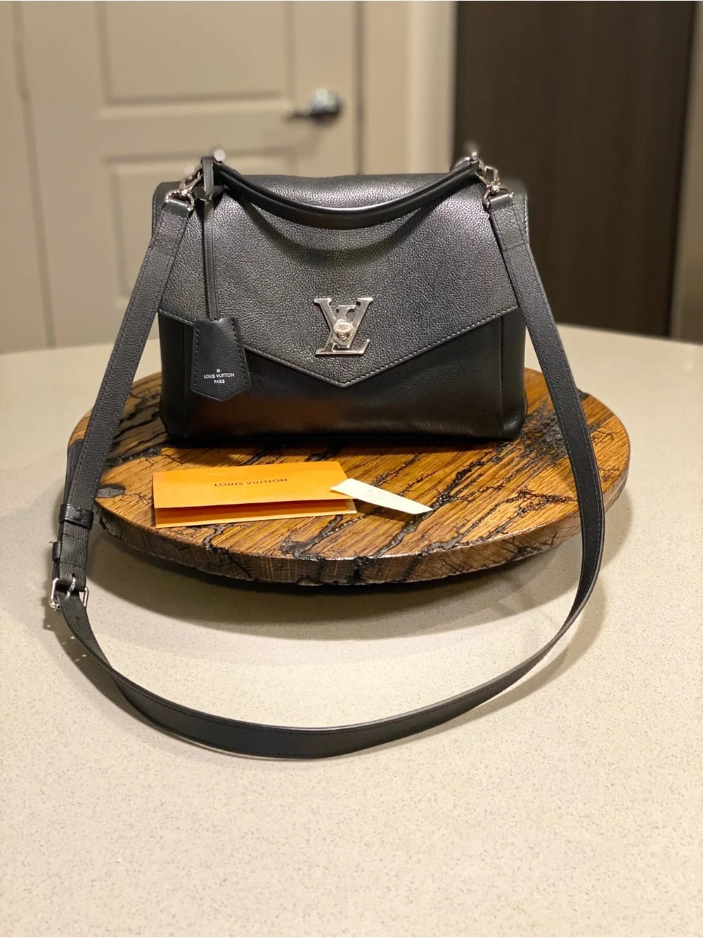 Louis Vuitton satchel refined